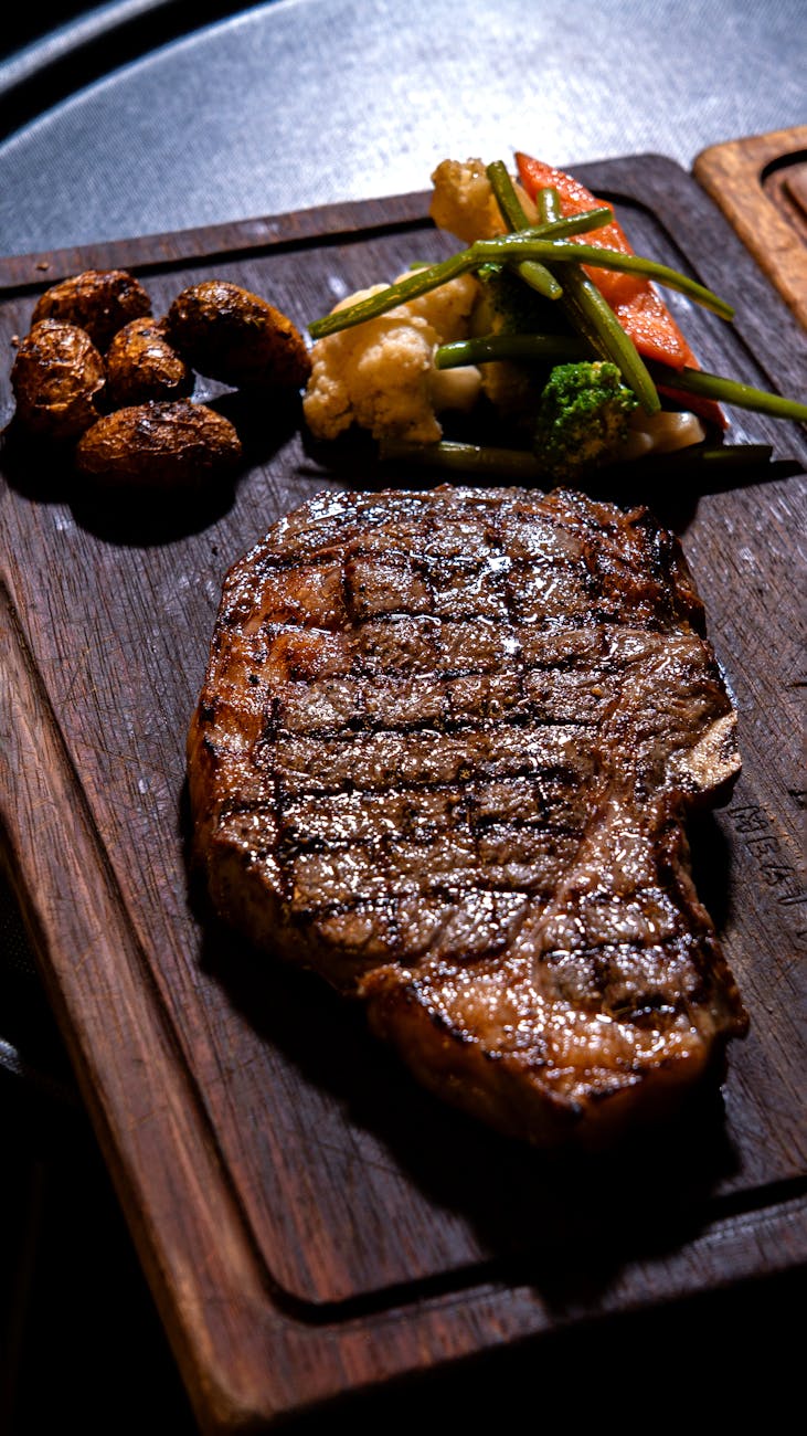 grilled ribeye steak with roasted vegetables