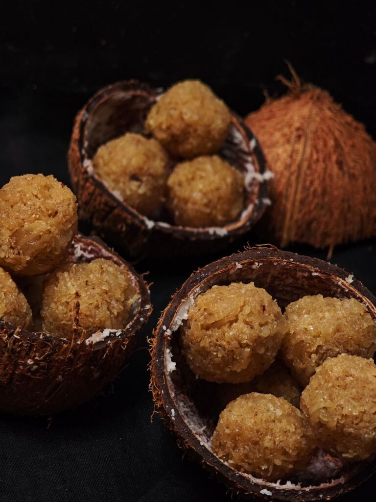 delicious coconut laddu desserts in halved shells