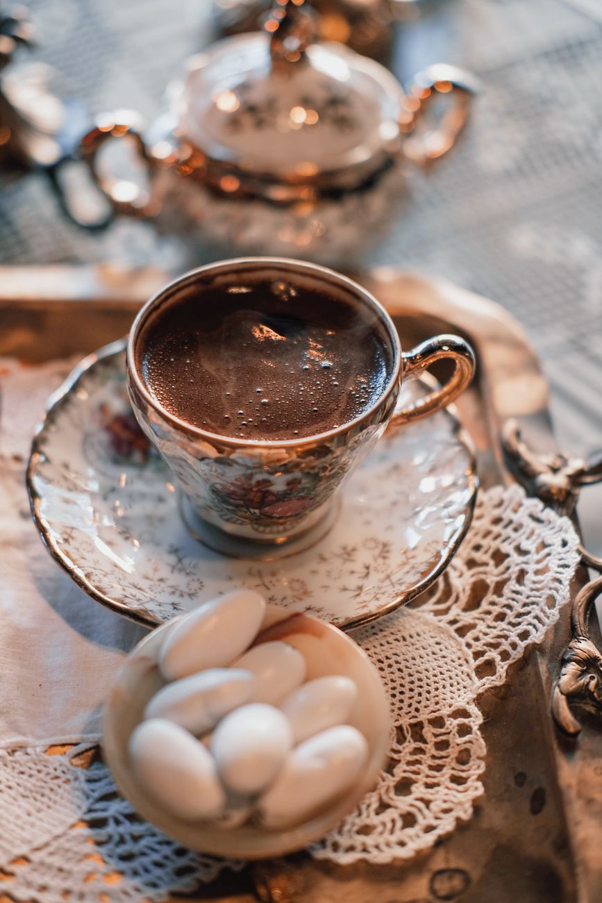 cup of coffee served in vintage china