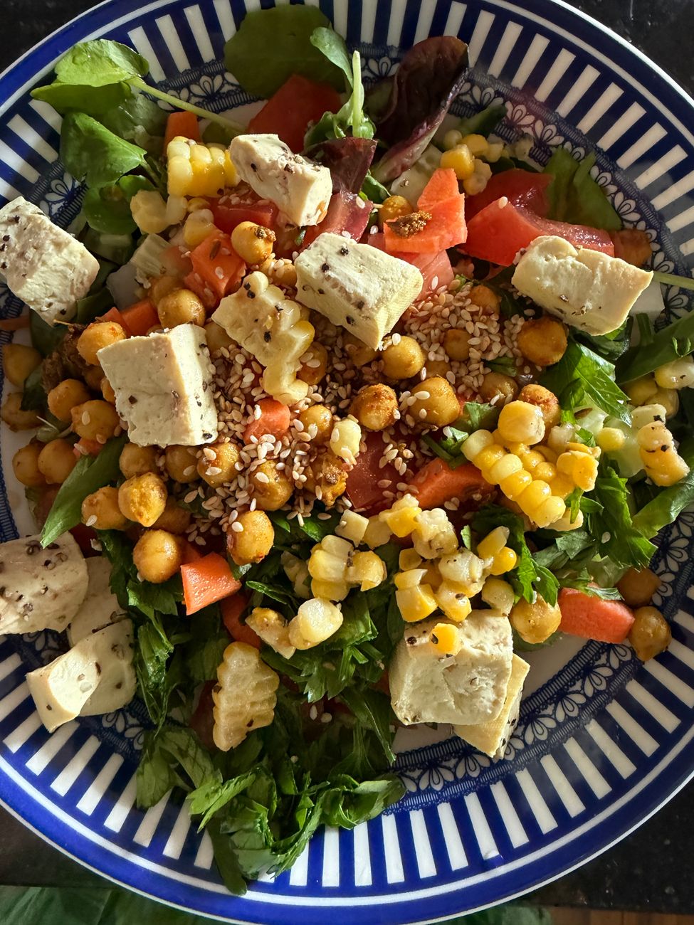 colorful vegan salad with chickpeas and tofu