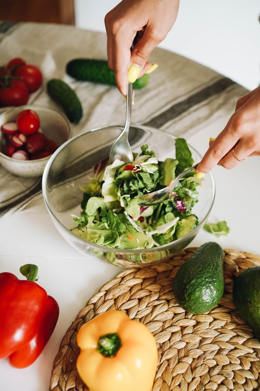 green vegetable salad in glass bowl