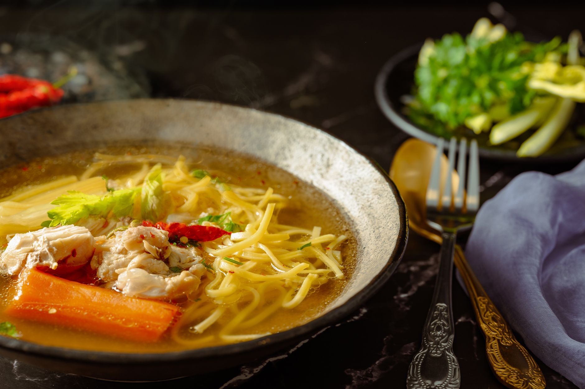 a close up shot of noodles in a bowl