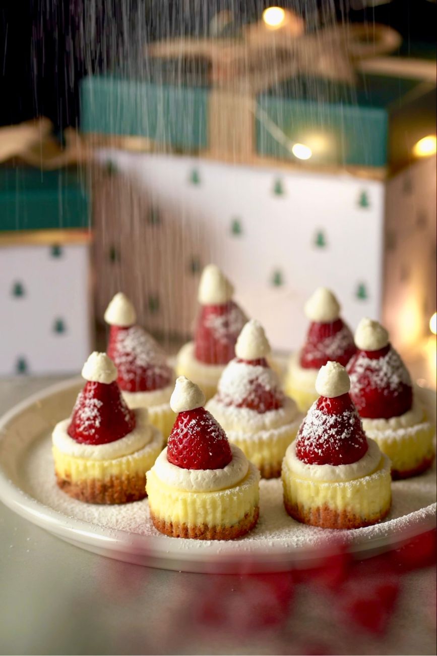decorative cupcakes with strawberries on a tray