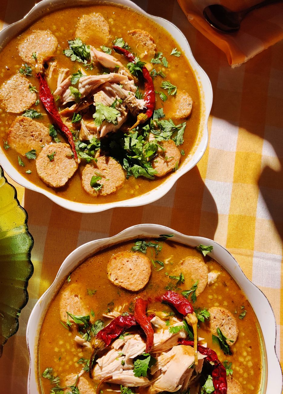 delicious spicy soup with chicken and herbs